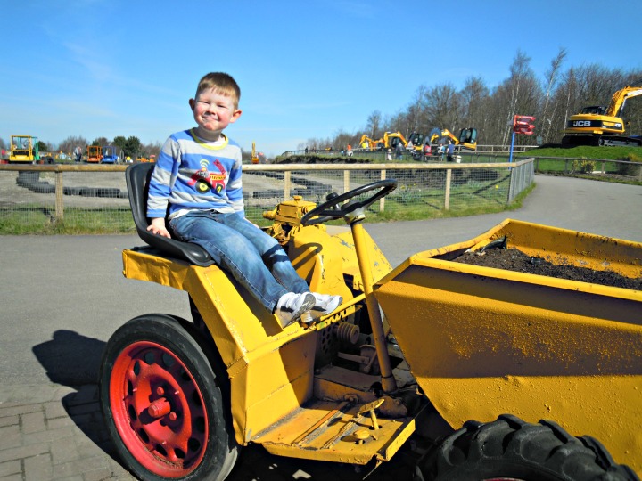 4 year old on a Dumper truck at Diggerland
