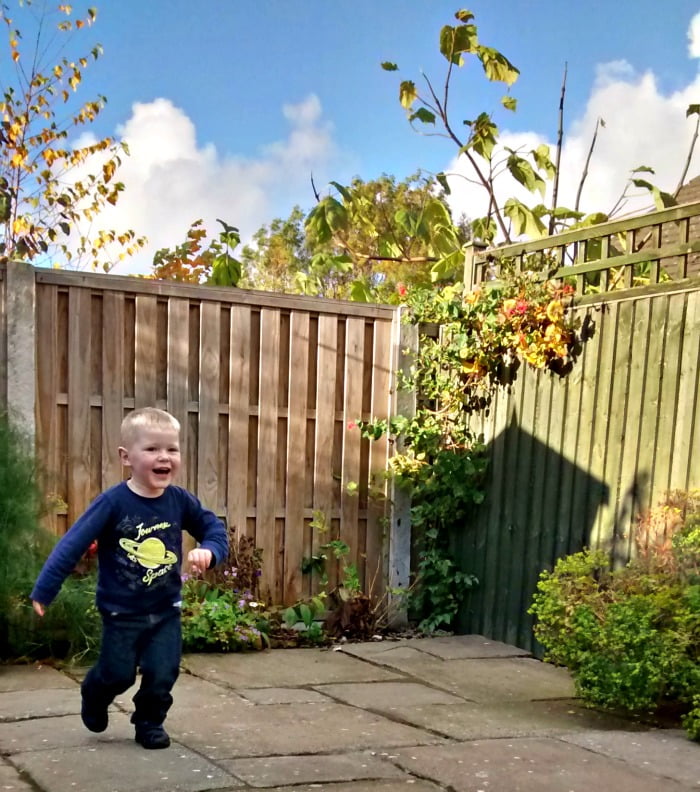 Daniel playing in the garden at Oakwood Mews cottage