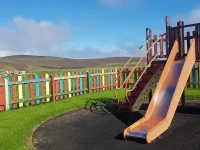 toddler friendly cottage with a playground